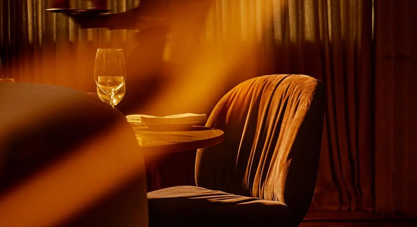 Dining chair and warm cinematic restaurant scene